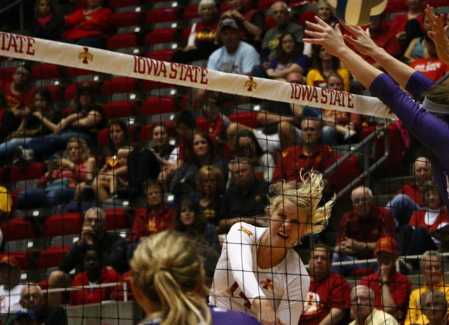 Jess Schaben, freshman, spikes the ball during the game against Kansas State. The Cyclones beat the Wildcats 3-0. 