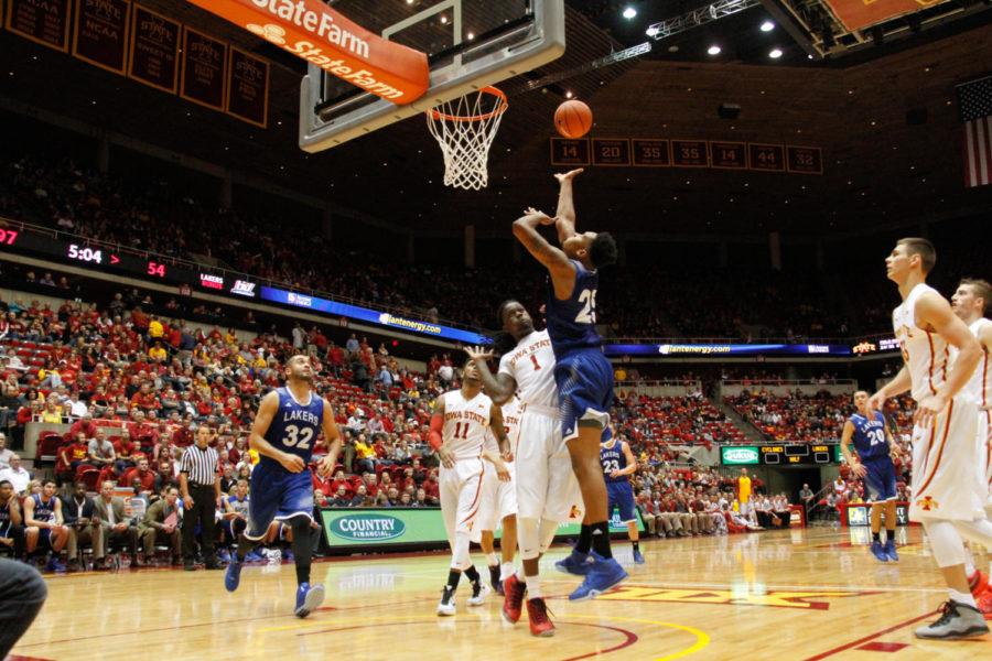 Laker senior Chaz Rollins takes a shot during an exhibition basketball game against the Grand Valley State Lakers. The Cyclones would go on to win 106-60.