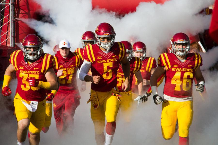 The Cyclones run out of the tunnel for the last time this season, before the game against Oklahoma State University on Nov. 14. The Cyclones would go on to lose 31-35.  