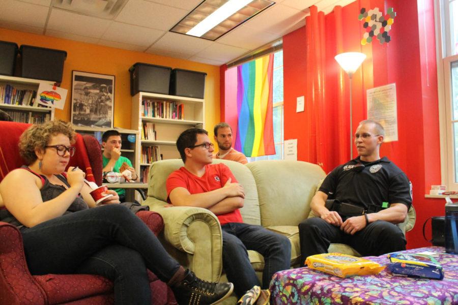Lt. Joshua Hale of the ISU Police Department answers questions for members of the LGBTQA community Sunday. ISU Police stressed the importance of feeling comfortable on campus and around Ames, and officers wants that safety to encompass all students.