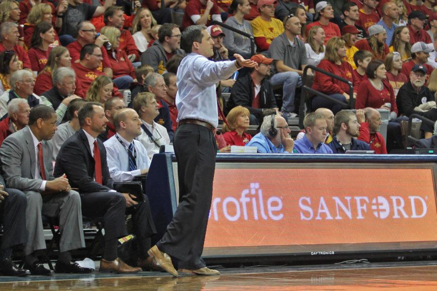 Head coach Steve Prohm pumps up the crowd in the Sanford Pentagon during the Cyclones' 68-62 win against Colorado on Nov. 13, 2015.