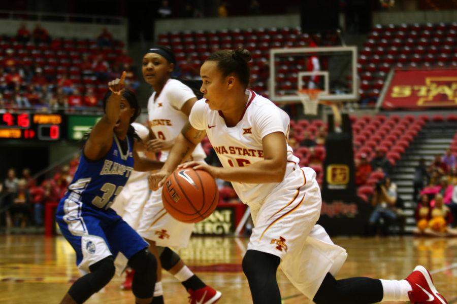 Iowa State senior guard Kidd Blaskowsky looks to pass the ball during the game against Hampton on Friday night. The Cyclones won their debut game against the Lady Pirates 95-59.