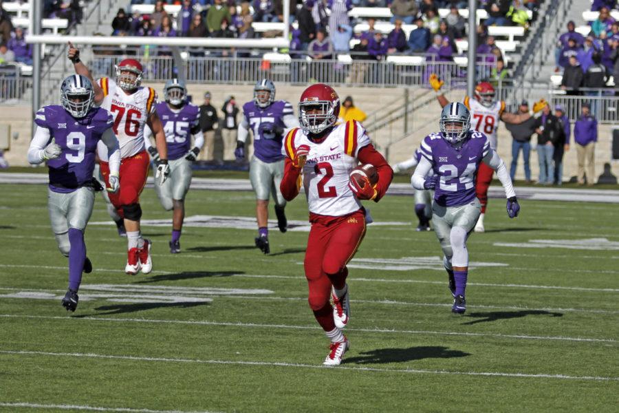 Mike Warren breaks away for a 76-yard touchdown run in the first half against Kansas State on Nov. 21 at Bill Snyder Family Stadium in Manhattan, Kan.