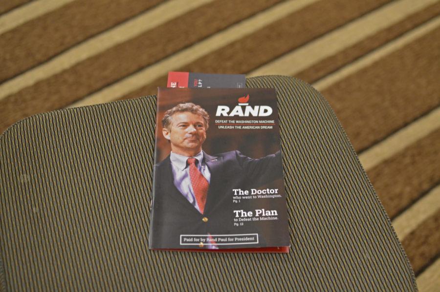 A Rand Paul pamphlet sits on a seat in the Hilton Garden Inn prior to a Paul meet and greet on Nov. 12. The pamphlet totes Paul's motto, "Defeat the Washington machine, unleash the American dream."