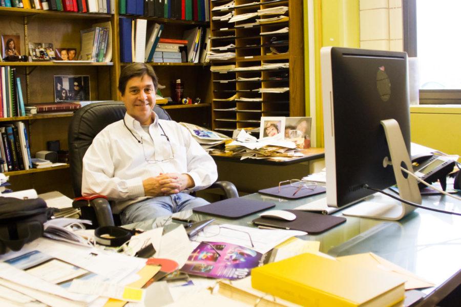 Professor Jim Cochran sits in his office in the Zaffarano Physics Addition. Cochran is part of a team that works with the Large Hadron Collider in Switzerland, studying particle physics.  