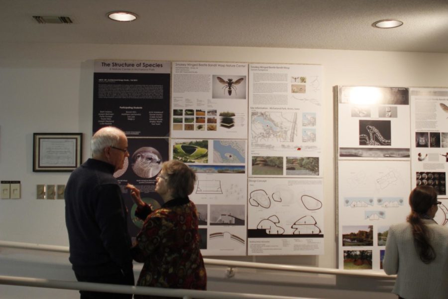 Attendees of the Structures of Species exhibition looked at students proposals. The exhibition took place Friday at McFarland Park. 