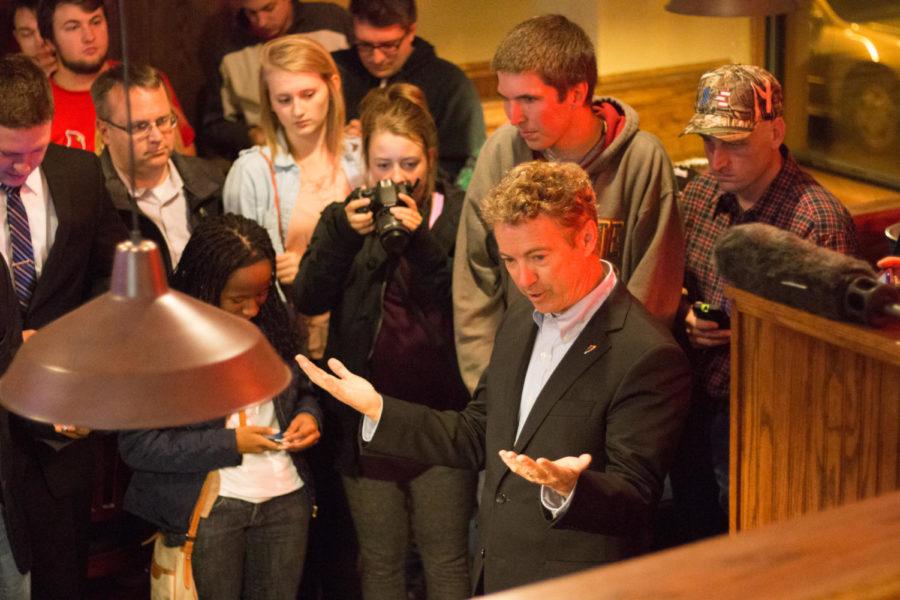 Republican presidential candidate and Kentucky senator Rand Paul speaks with supporters at Jeff's Pizza Wed. night. Paul spent the day in Iowa as part of a grassroots swing, starting the day in Council Bluffs, and ending in Ames. 