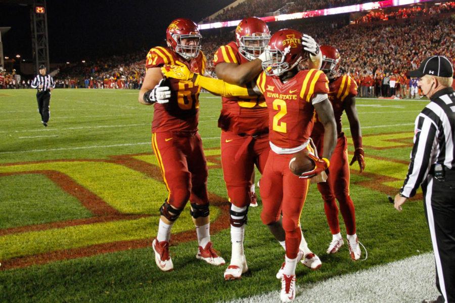 Running back Mike Warren celebrates a touchdown during a game against TCU on Oct. 17, 2015. The Cyclones lost 45-21.