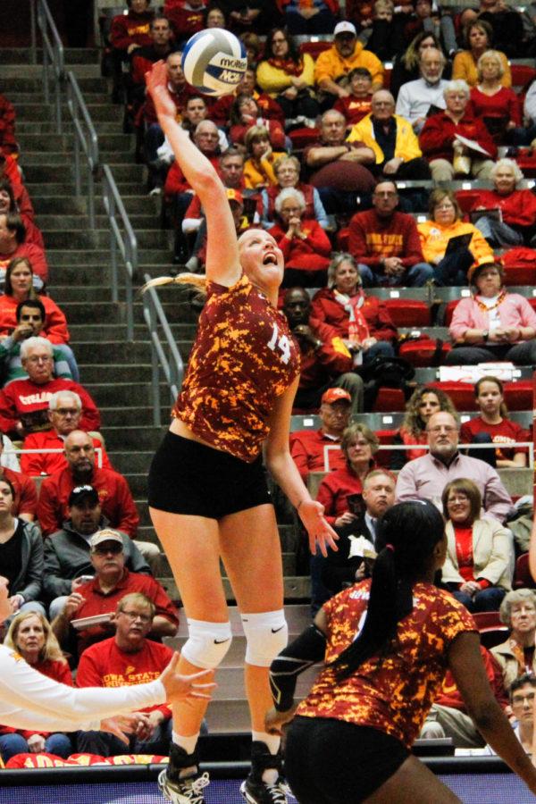 Freshman Jess Schaben hits the ball during a match against the Texas Longhorns in a game in Hilton Coliseum on Saturday. The Cyclones would go on to lose 3-0. 