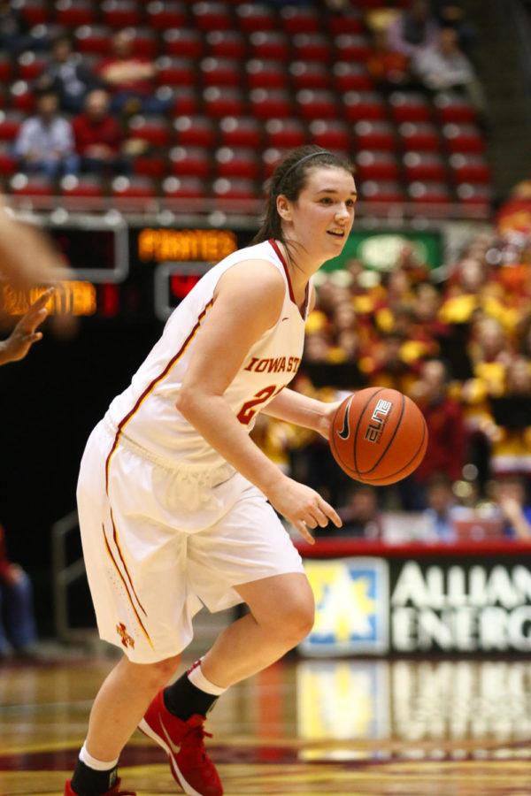 Iowa State freshman guard Bridget Carleton looks to pass the ball during the game against Hampton on Friday night. The Cyclones won their debut game against the Lady Pirates, 95-59.