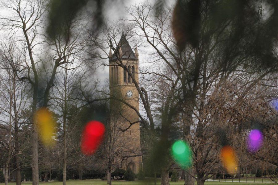 The Campanile can be seen behind the lights of the christmas tree displayed on central campus.