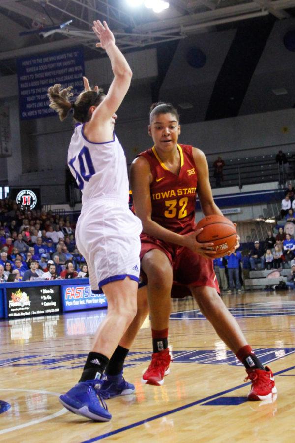 Freshman forward Meredith Burkhall tries to work around a defender during a game against the Drake Bulldogs, Nov. 15 in Des Moines. The Cyclones would go on to lose 74-70.