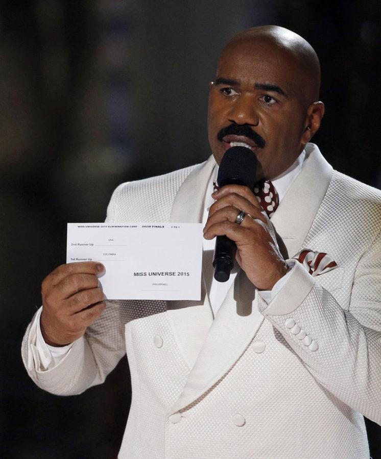 Miss Universe host Steve Harvey holds up the card showing the winners after he mistakenly announced Miss Colombia (Ariadna Gutierrez) as the winner at the Miss Universe pageant. Miss Philippines (Pia Wurtzbach) was named Miss Universe. 