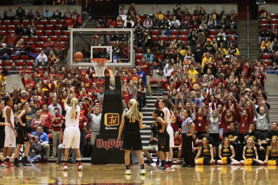 Redshirt sophomore Jadda Buckley takes a free throw with the Iowa State student section giving her spirit fingers. The student section helped in the 69-66 victory over Iowa on Dec. 11. 