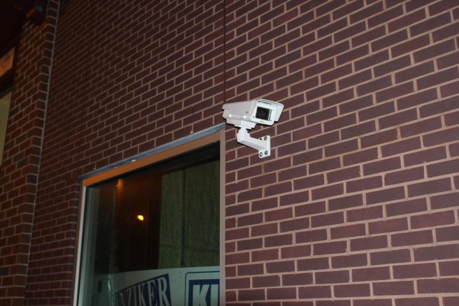 A security camera installed on a building in Campustown.