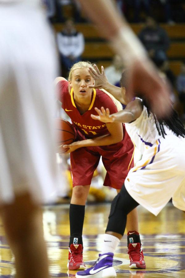 Iowa State redshirt sophomore guard Jadda Buckley looks to pass the ball during the game against UNI in Cedar Falls Wed. night. The Cyclones went on to defeat the Panthers 84-75, making it their 12th straight win against them. 