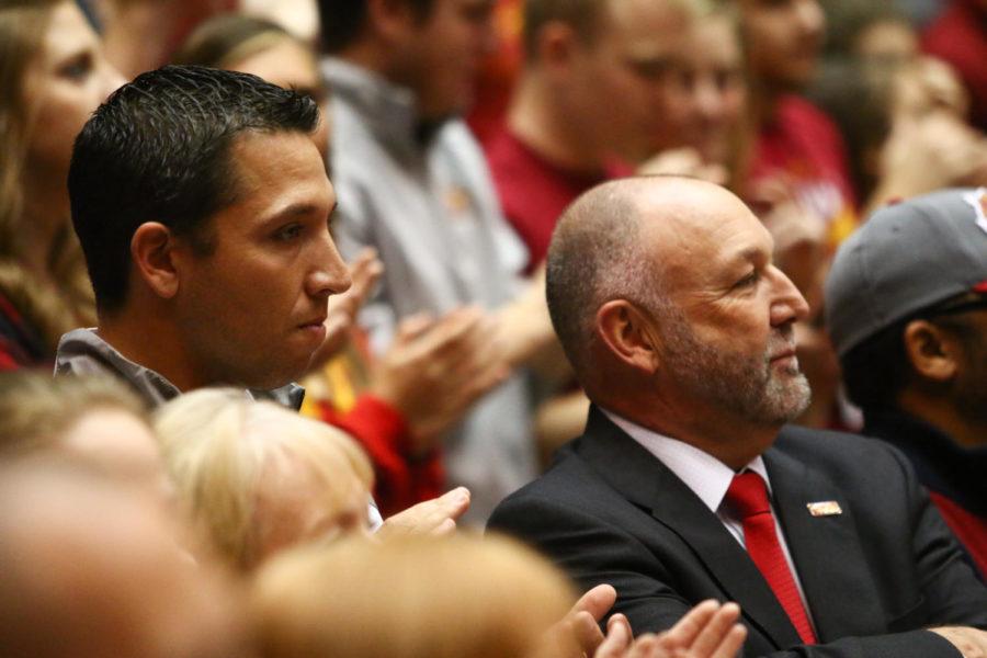 Head football coach Matt Campbell and President Steven Leath watch the men's basketball game against North Dakota State University at Hilton Coliseum on Tuesday night. Campbell was introduced to Hilton for the first time at the game. 