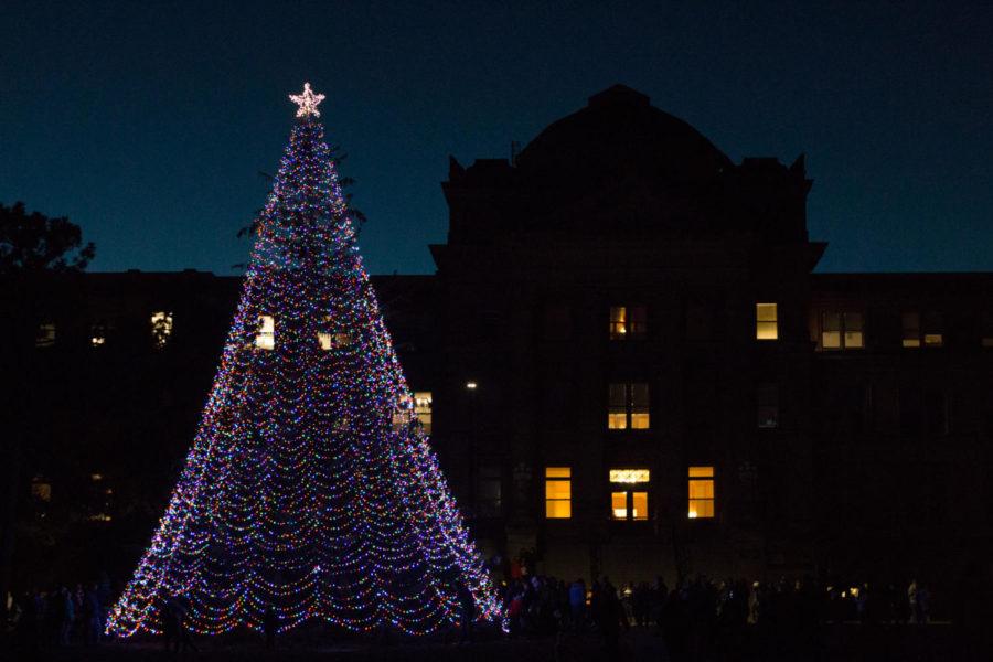 The holiday tree outside Beardshear Hall was lit Friday night, signifying the beginning of WinterFest. 