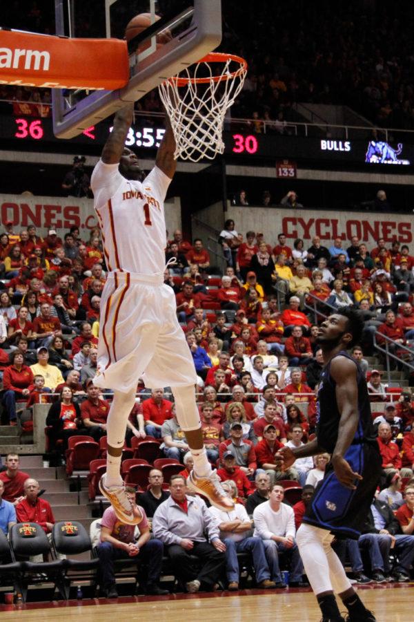 Senior Jameel McKay dunks during a basketball game against the Buffalo Bulls on Dec. 7 in Hilton Coliseum. The Cyclones would go on to win 84-63.