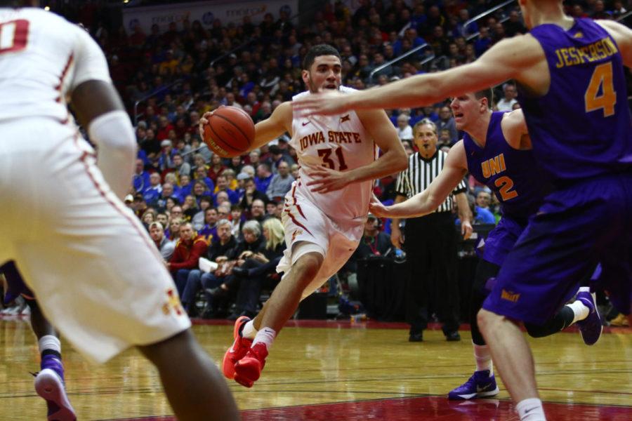 Iowa State senior forward Georges Niang runs down the court during the game against UNI at Wells Fargo Arena. The unranked Panthers would go on to give Iowa State their first loss of the season, defeating the Cyclones 81-79.
