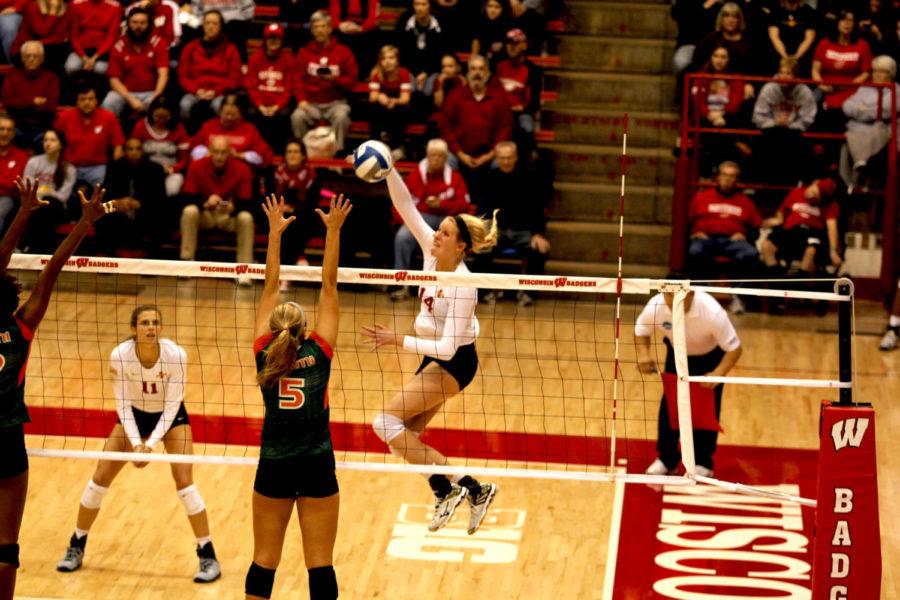 Freshman outside hitter Jess Schaben jumps up for the kill and hits it over the Miami blockers in the 25-21, 26-24, 25-20 win on Dec. 3. This means that Iowa State will advance to the second round of the NCAA Tournament and play on Dec. 4. Schaben had 16 kills in tonights win. 