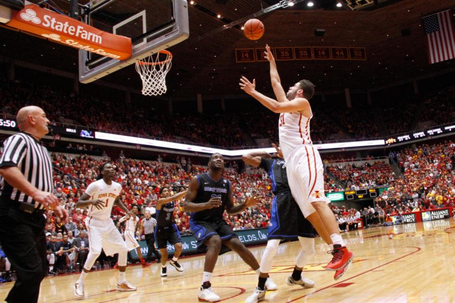 Senior Georges Niang takes a shot during a basketball game against the Buffalo Bulls on Dec. 7 in Hilton Coliseum. The Cyclones would go on to win 84-63.