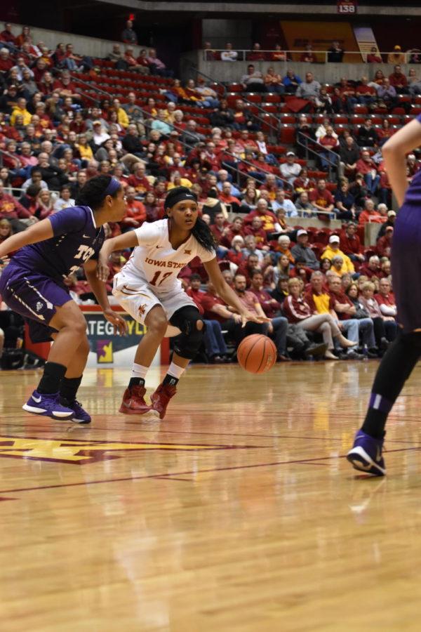 Seanna Johnson, junior guard, blocks an opponent from TCU during the game on Jan. 27. This was her 13th game of the season with 10 or more rebounds. ISU fell 72-62.