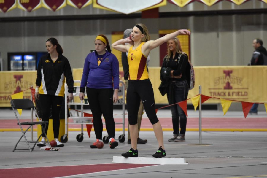 Senior Kaci Storm practices shot put before her turn at the Big 4 Duals on Jan. 23.