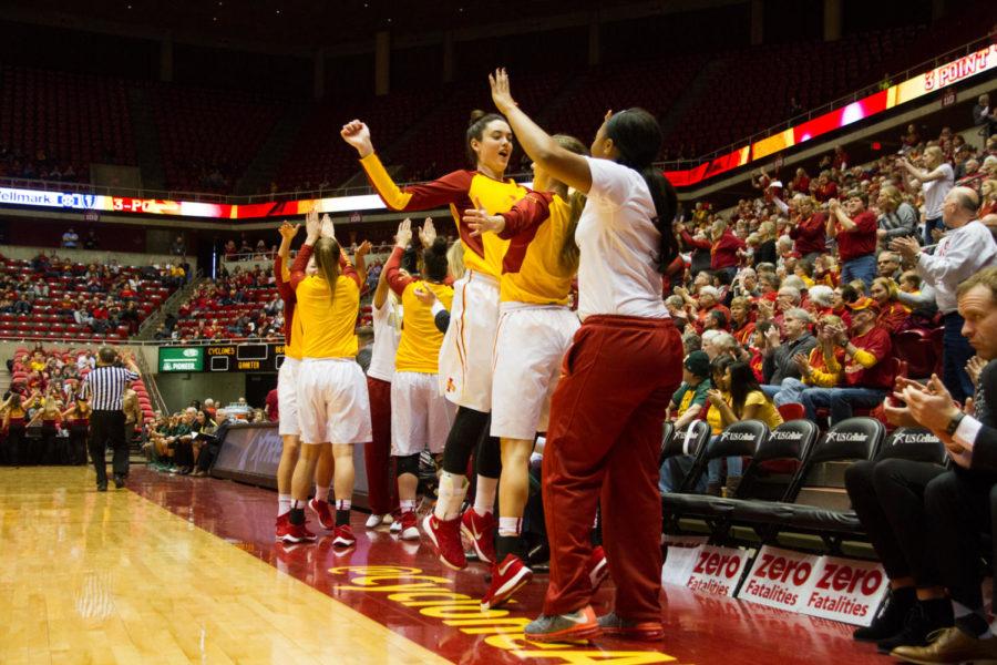 The Iowa State bench reacts after a three point shot during the Jan. 23 game in Hilton Coliseum against the Baylor Bears.  The Cyclones lost 77-61. 