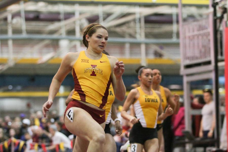 Freshman Kate Hall sprints out to a lead in the 60-meter dash at the Big 4 Duals on Jan. 23. Hall won the event with a time of 7.30 seconds.