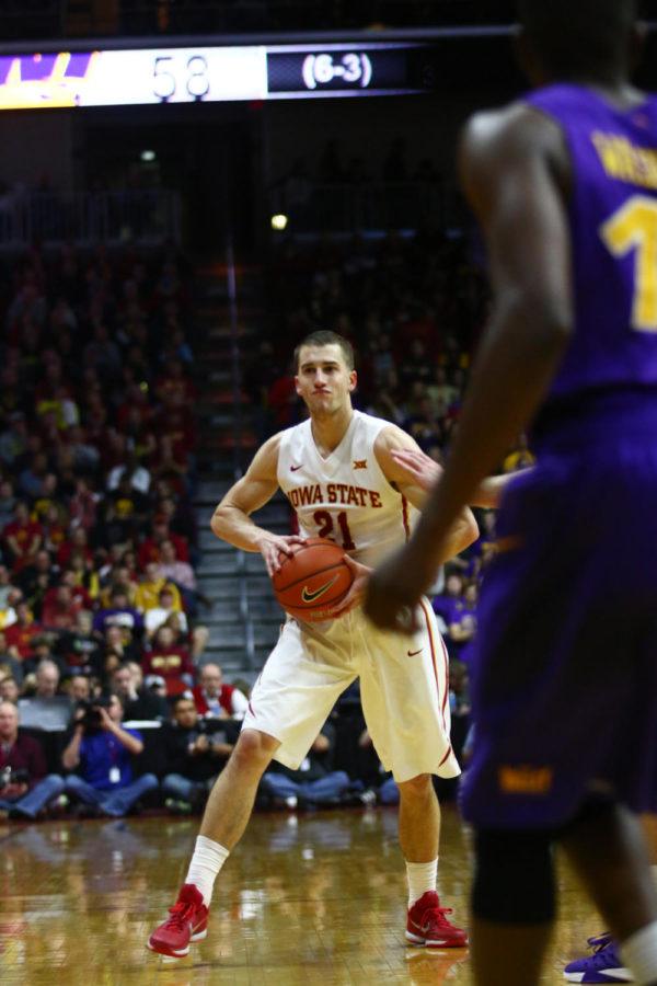 Iowa State junior guard Matt Thomas looks to pass the ball during the game against UNI at Wells Fargo Arena. The unranked Panthers would go on to give Iowa State their first loss of the season, defeating the Cyclones 81-79.