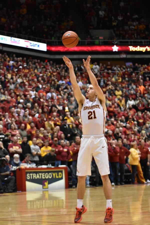 Matt Thomas, junior guard, shoots the ball during the basketball game against Oklahoma on Jan. 18. ISU won 82-77. This was ISU's second win against an AP No. 1 team since 1957.