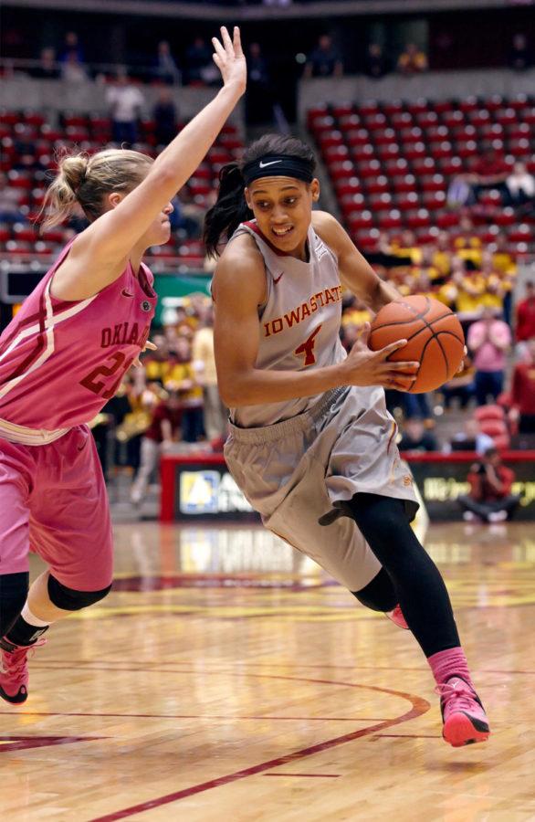 Senior guard Nikki Moody drives to the basket late in the second half of the ISU womens basketball game against Oklahoma on Feb. 17 at Hilton Coliseum. Iowa State won 84-76 in overtime.