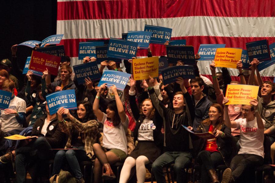 Bernie Sanders supporters participate in cheers before the town hall event at Stephens Auditorium Monday afternoon. 