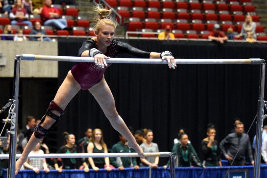 Junior Sara Townsend competes on the uneven parallel bars at the NCAA Regionals on Saturday at Hilton Coliseum.