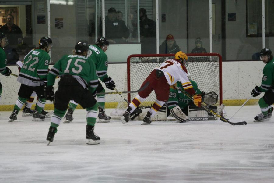 Tony Uglem, freshman forward, prepares to shoot a goal during the game against the Twin City Steel on Friday night. The Cyclones would go on to defeat the Steel 5-2.