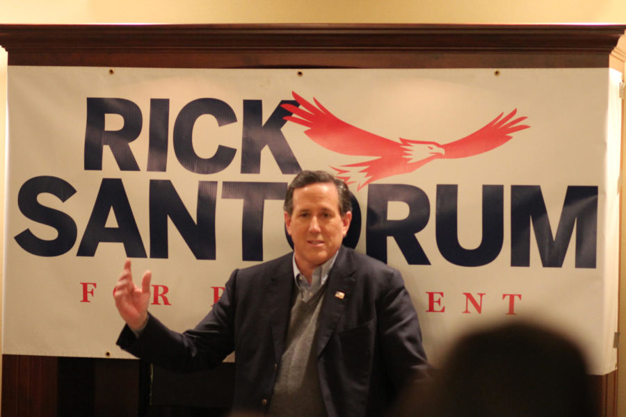 Rick Santorum answers questions from audience members at a house party in Ames. Santorum was the special guest at a house party in North Ames on Jan. 27. 