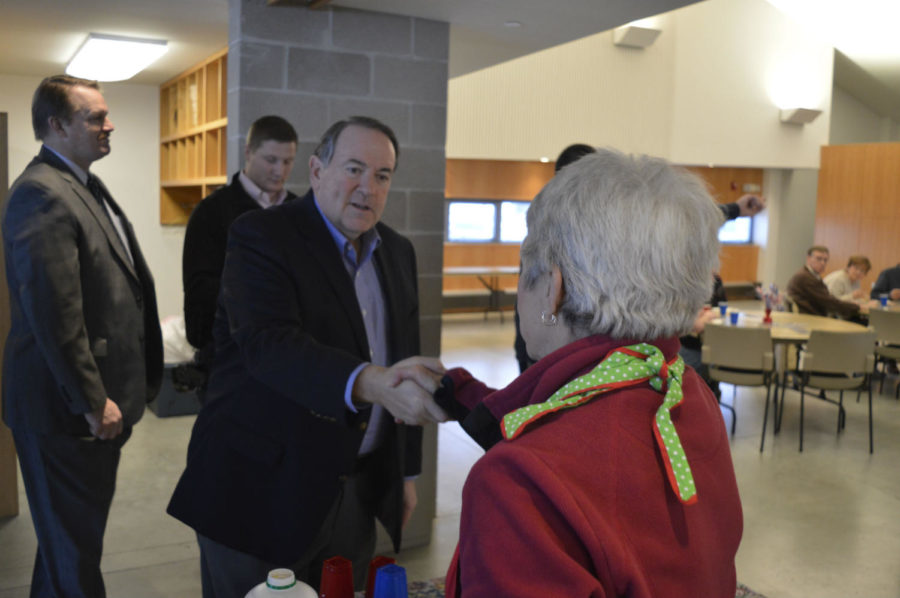 Former Arkansas Gov. Mike Huckabee, 2016 Republican presidential candidate, greet supporters at Oakwood Road Church in Ames on Jan. 4.