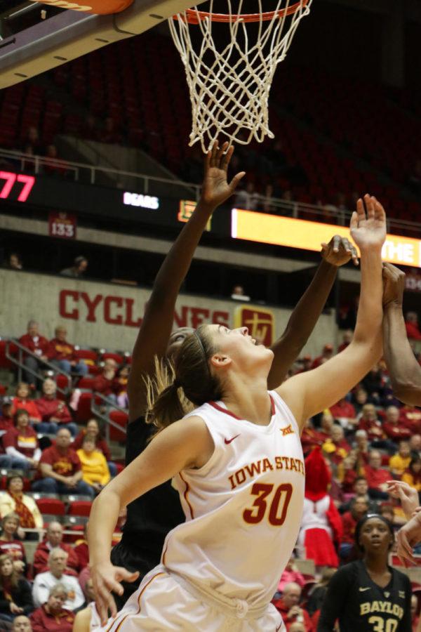 Claire Ricketts, redshirt freshman forward, goes in for a layup during the game against Baylor on Saturday afternoon. The Lady Bears would go on to give the Cyclones their third loss in a row, winning 77-61.