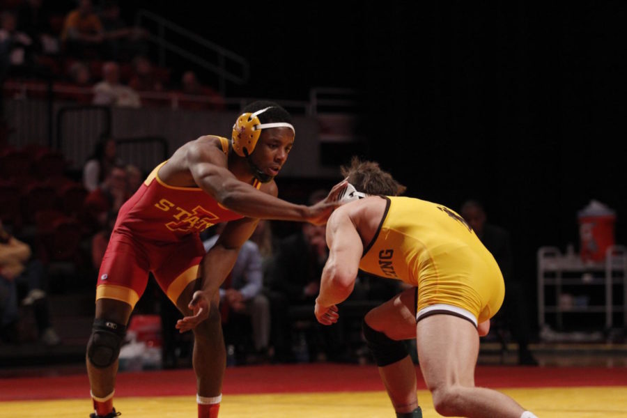 John Meeks, redshirt junior, wrestled at 141 pounds at the match against University of Wyoming on Dec. 12.