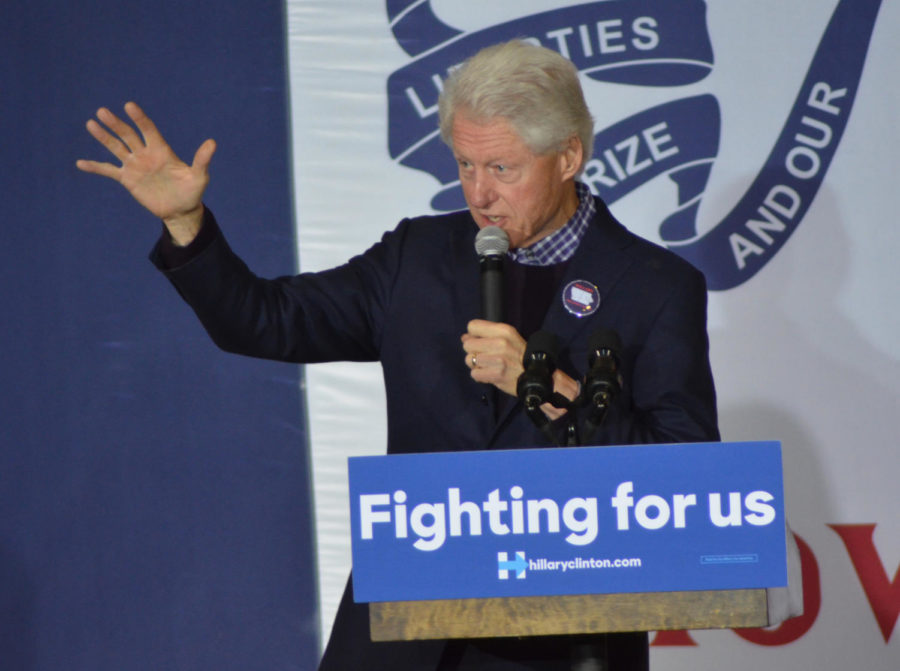 Bill Clinton, former President of the United States of America, and daughter Chelsea Clinton campaign for Hillary Clinton. They spoke at Lincoln High School in Des Moines, Iowa. Bill and Chelsea encouraged suppoters to go out and caucus.