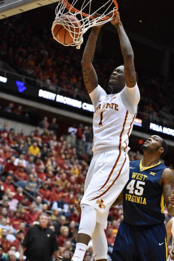 Redshirt senior forward Jameel McKay dunks at the West Virginia game on Feb. 2.