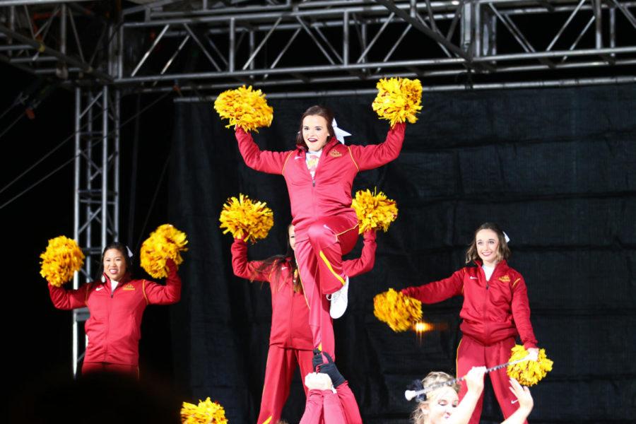 Members of the Cyclone spirit squad perform at the pep rally Friday night.