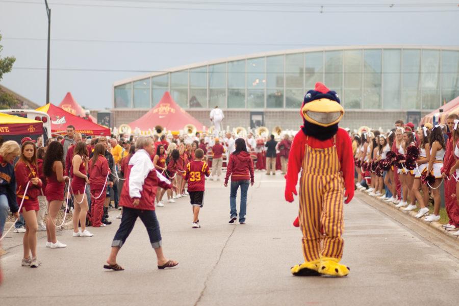 Cy walks among the crowd gathered to tailgate before the Cyclones first game of the season on Thursday, Sept. 2.