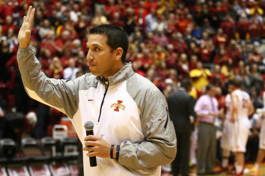 New head football coach Matt Campbell waves to the crowd at Hilton Coliseum on Tuesday night. Campbell, former head football coach at Toledo University, was hired last week.