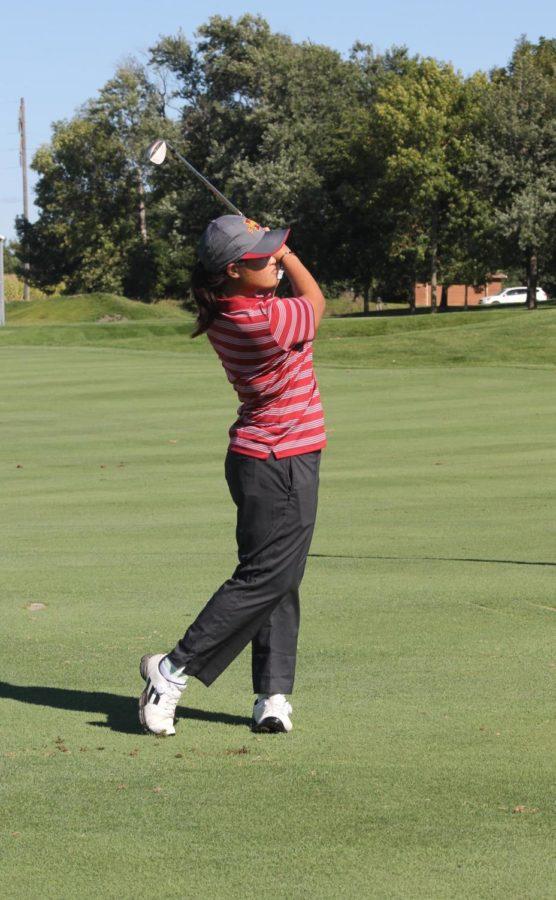 Nattapan Siritrai, sophomore on the ISU womens golf team, practices her swing.