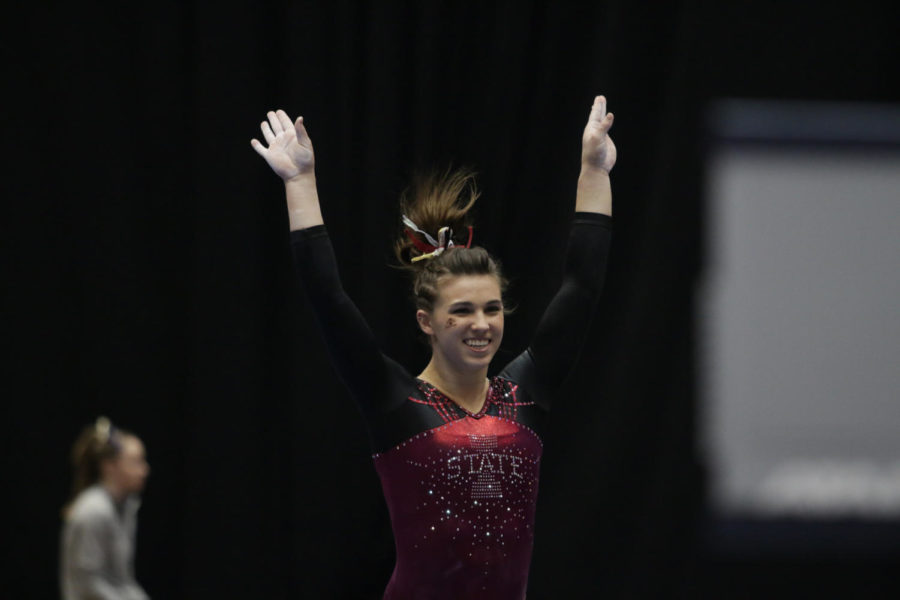 Freshman+Meaghan+Sievers+sticks+her+dismount+after+her+balance+beam+routine+during+the+meet+against+West+Virginia+on+Feb.+5.+Sievers+scored+a+9.75%2C+contributing+to+the+Cyclones+narrow+195.3-195.2+victory+over+the+Mountaineers.+%C2%A0