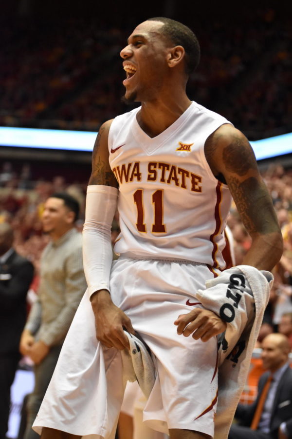 Junior guard Monte Morris cheers after Georges Niang took charge during the Kansas State basketball game Feb. 27.