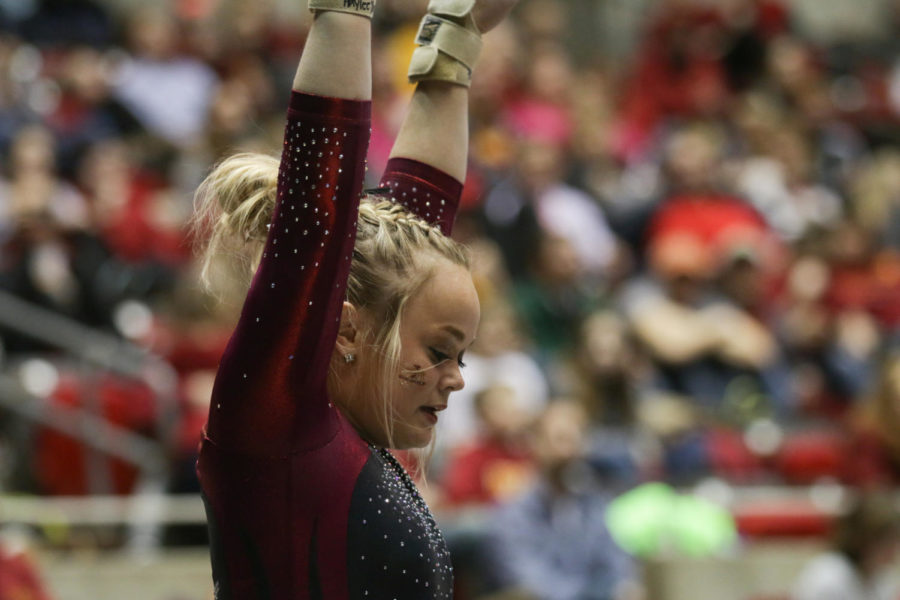 Haylee Young, sophomore, performs her floor routine during the meet against Lindenwood and North Carolina State Jan. 23. Young would go on to score a 9.85.