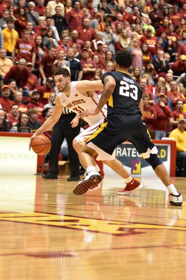 Senior forward Georges Niang dribbles down the court at the game against West Virginia on Feb. 2. ISU fell 81-76.